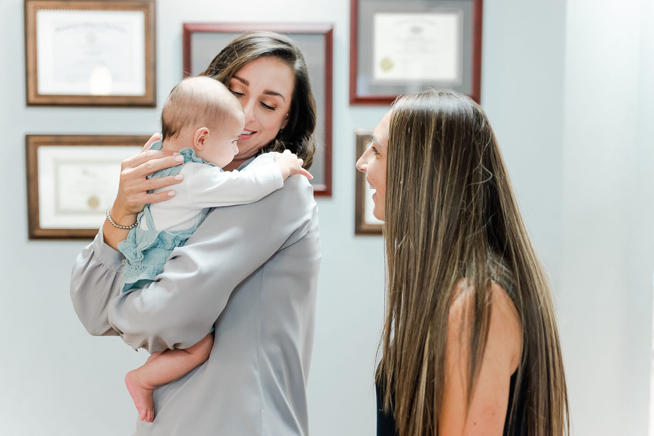 mom with her baby at the dentist